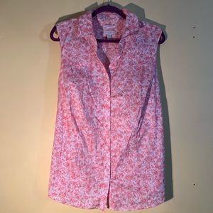 Sleeveless button down in floral print.